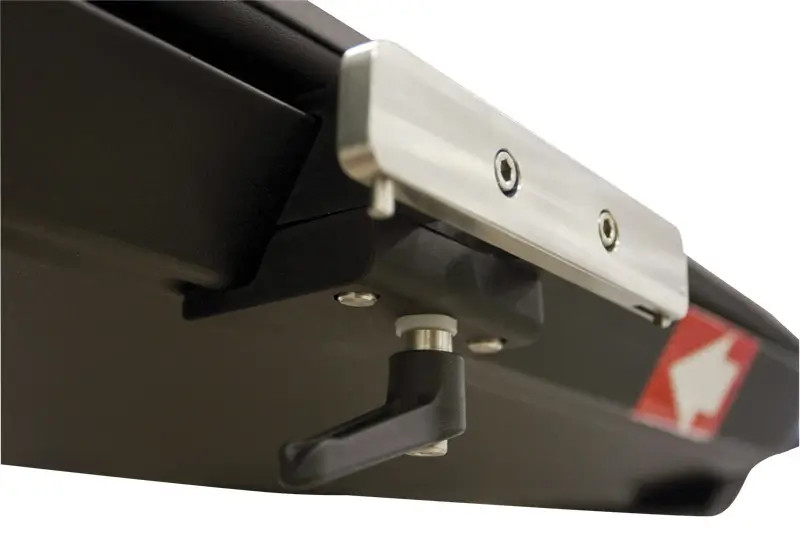 Could you explain the design features of the 63336 OakWorks Adjustable T-Rail Clamp?